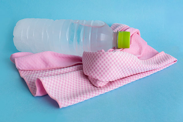 Bottled water and a towel